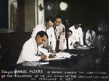 Manuel Roxas signs the Constitution