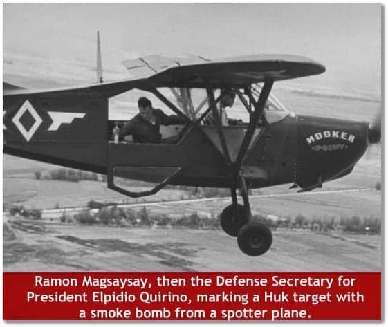 Ramon Magsaysay, then the Defense Secretary for President Elpidio Quirino, marking a Huk target with a smoke bomb from a spotter plane