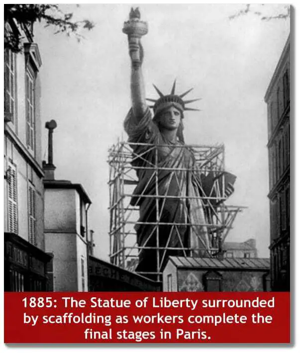 The Statue of Liberty surrounded by scaffolding as workers complete the final stages in Paris.