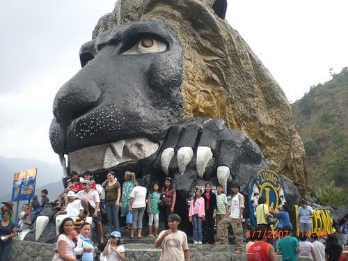 The man-made Lion's Head and tourists