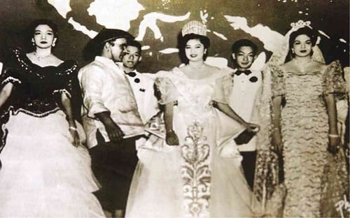 Young Ninoy Aquino serving as an escort to Miss Philippines winner and townmate Maria Cristina Galang in 1953