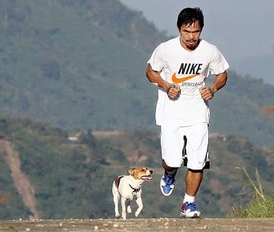 manny pacquiao running with dog