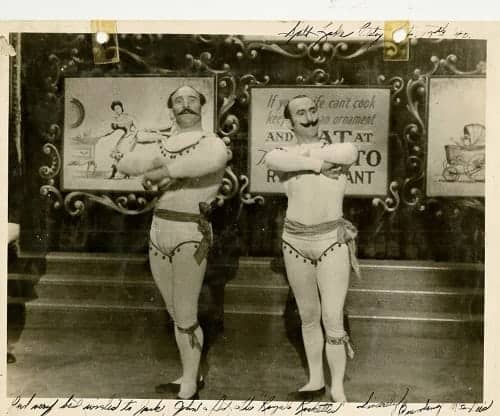 old time acrobats wearing tight fitting shorts