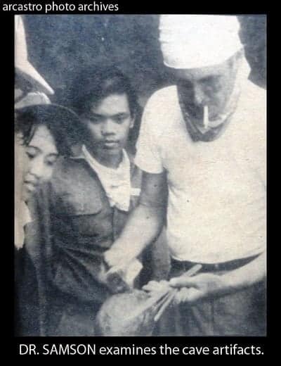 Dr. Jose Samson examines cave artifacts from Punta Libod