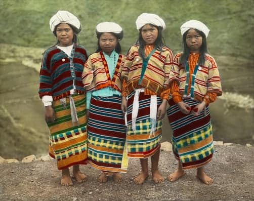 Four Benguet Igorot schoolgirls pose for a portrait in northern Luzon